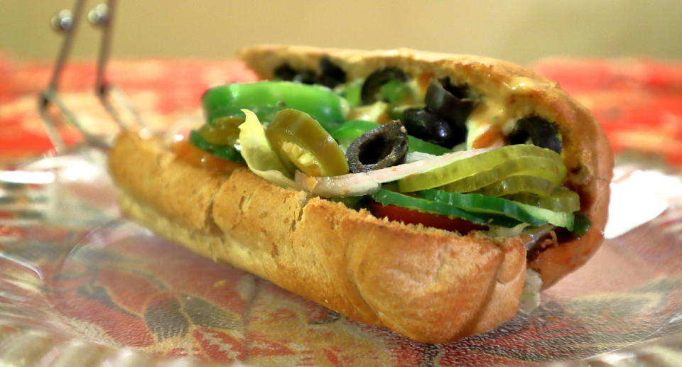 One man joked the woman had her feet up to measure a foot-long sub. Source: Getty Images (file pic)