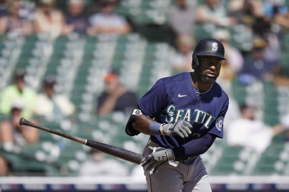 Seattle Mariners' Taylor Trammell tosses his bat after a bases on balls during the sixth inning of a baseball game against the Detroit Tigers, Thursday, Sept. 1, 2022, in Detroit. (AP Photo/Carlos Osorio)