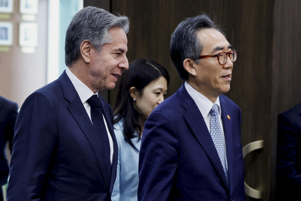 U.S. Secretary of State Antony Blinken, left, walks with South Korean Foreign Minister Cho Tae-yul at the third Summit for Democracy in Seoul, South Korea, Monday, March 18, 2024. (Evelyn Hockstein/Pool Photo via AP)