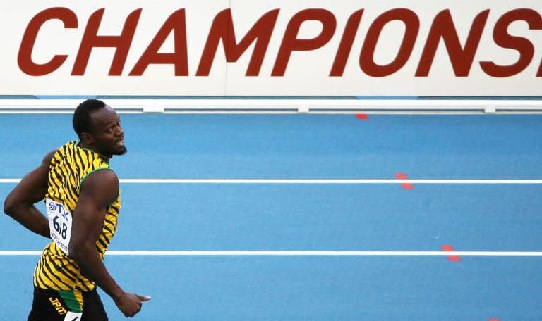 Usain Bolt after competing in the 200m qualifiers at the World Athletics Championships in Moscow on August 16, 2013. He clocked an easy-going 20.66sec to negotiate his way into the semi-finals of the 200m at the championships