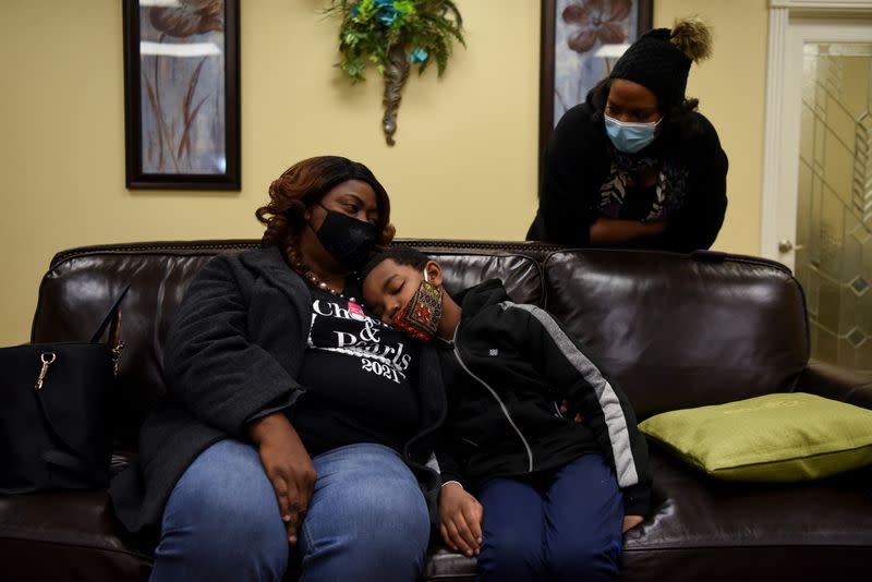 The Wider Image: 'I just ask God to help me': Texas funeral home crushed by death as U.S. COVID toll nears 500,000