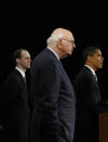 FILE - In this Nov. 26, 2008, file photo President-elect Barack Obama, right, stands with former Federal Reserve Chairman Paul Volcker, chairman-designate of the Economic Recovery Advisory Board, center, and chief economist-designate Austan Goolsbee, left, as he speaks at a news conference in Chicago. Volcker, the former Federal Reserve chairman died on Sunday, Dec. 8, 2019, according to his office, He was 92. (AP Photo/Pablo Martinez Monsivais, File)