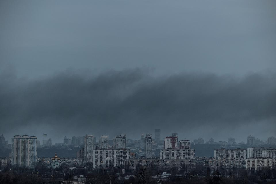 A thick cloud of smoke billows after Russian missile targets Kyiv today morning (Reuters)