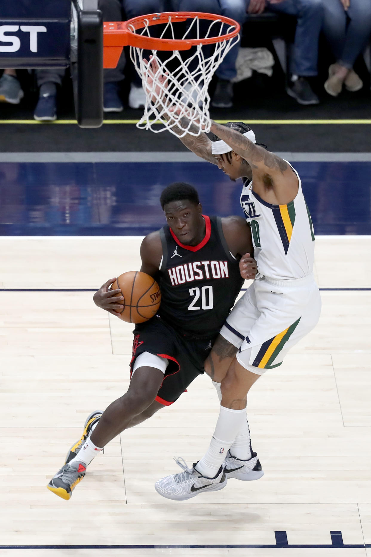 May 8, 2021; Salt Lake City, Utah, USA; Houston Rockets guard Khyri Thomas (20) drives to the basket against Utah Jazz guard Jordan Clarkson (00) in the second quarter at Vivint Arena. Mandatory Credit: Rob Gray-USA TODAY Sports