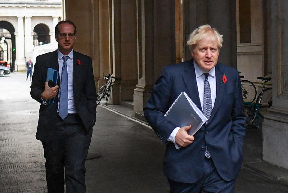 This file picture taken on November 10, 2020,  shows Boris Johnson and Martin Reynolds arriving at Downing Street  (AFP via Getty Images)