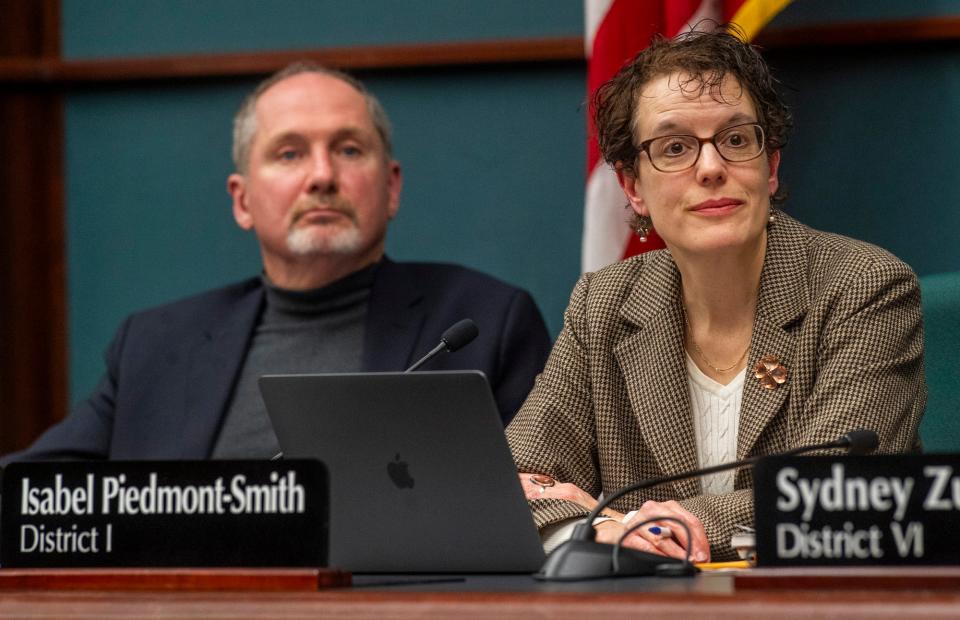 Bloomington City Council President Isabel Piedmont-Smith and member Dave Rollo listen to Mayor Kerry Thomson during a meeting at city hall on Wednesday, Jan. 10, 2024.