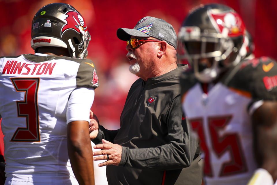 Buccaneers coach Bruce Arians, center, won't commit to Jameis Winston coming back for 2020. (Will Vragovic/Getty Images) 