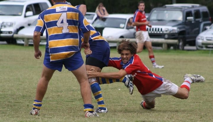 Jordan McGuinness playing football.