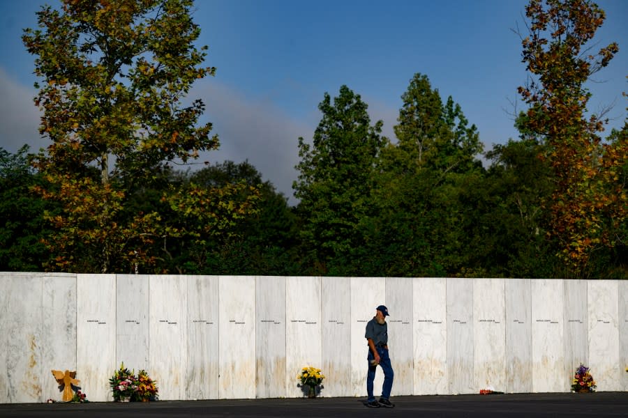 SHANKSVILLE, PENNSYLVANIA – SEPTEMBER 11: A relative of one of the victims pays his respects at the Wall of Names before a ceremony commemorating the 22nd anniversary of the crash of Flight 93 during the September 11, 2001 terrorist attacks at the Flight 93 National Memorial on September 11, 2023 in Shanksville, Pennsylvania. The nation is marking the 22nd anniversary of the September 11 attacks, when the terrorist group al-Qaeda flew hijacked airplanes into the World Trade Center, Shanksville, PA and the Pentagon, killing nearly 3,000 people. (Photo by Jeff Swensen/Getty Images)