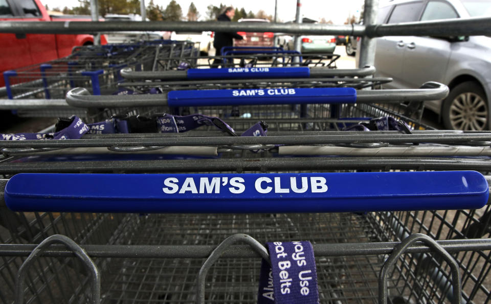 Shopping carts in a corral in the parking lot of a Sam's Club store in Concord, N.H., Friday, Feb. 23, 2018. (AP Photo/Charles Krupa)