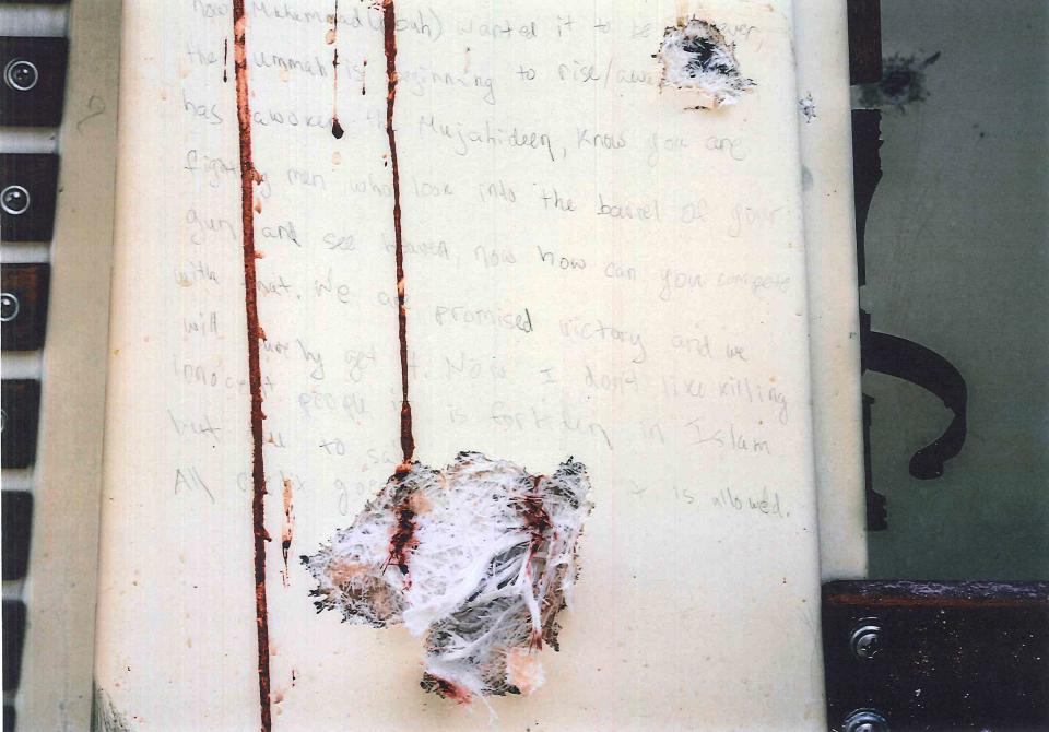 A blood-stained message that prosecutors say Dzhokhar Tsarnaev wrote on the inside of a boat is seen with bullet holes in an undated evidence picture shown to jurors in Boston on March 10, 2015. Tsarnaev, 21, is accused of killing three people and injuring 264 with a pair of homemade bombs at the crowded finish line of the race on April 15, 2013, as well as fatally shooting a police officer three days later as he and his brother, Tamerlan Tsarnaev, tried to flee the city. (Photo: U.S. Department of Justice/Handout via Reuters) (UNITED STATES - Tags: CRIME LAW) FOR EDITORIAL USE ONLY. NOT FOR SALE FOR MARKETING OR ADVERTISING CAMPAIGNS. THIS IMAGE HAS BEEN SUPPLIED BY A THIRD PARTY. IT IS DISTRIBUTED, EXACTLY AS RECEIVED BY REUTERS, AS A SERVICE TO CLIENTS