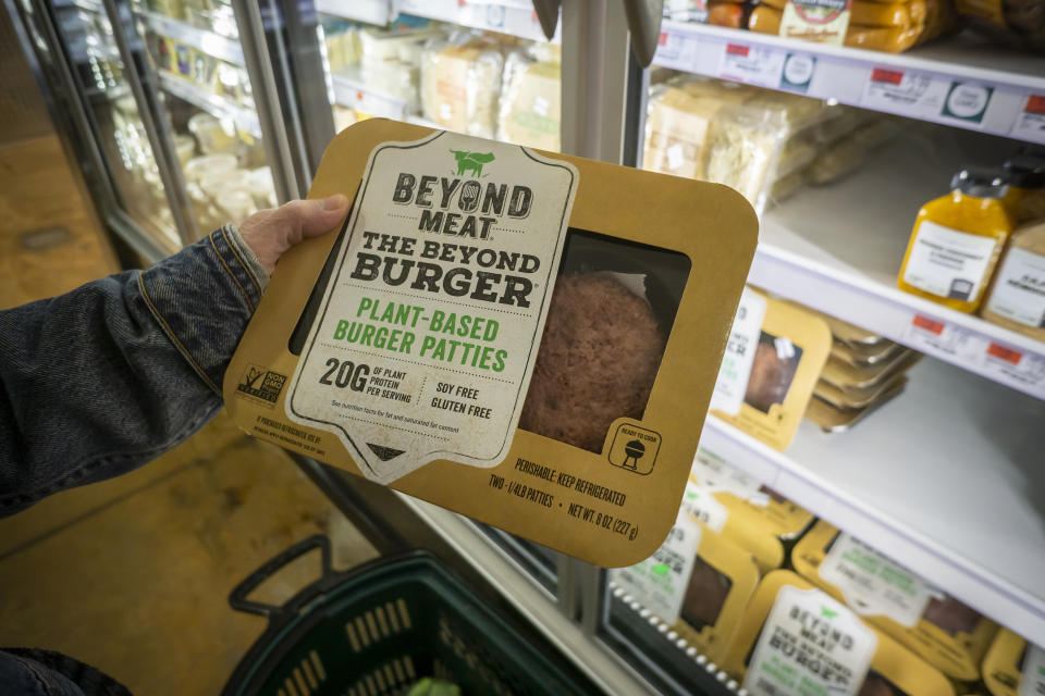 A shopper chooses a package of Beyond Meat from a freezer in a supermarket. Photo: Richard B. Levine/SIPA USA/PA Images
