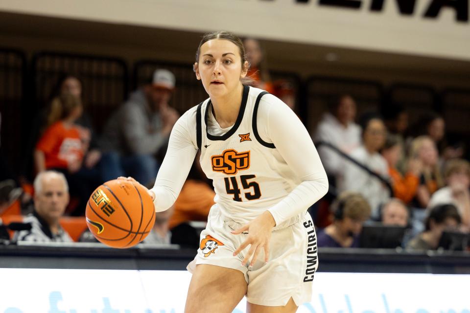 Jan 28, 2024; Stillwater, Okla, USA; Oklahoma State Cowgirls guard Emilee Ebert (45) drives the lane in the first half of a womenÕs NCAA basketball game against the Baylor Lady Bears at Gallagher Iba Arena. Mandatory Credit: Mitch Alcala-The Oklahoman