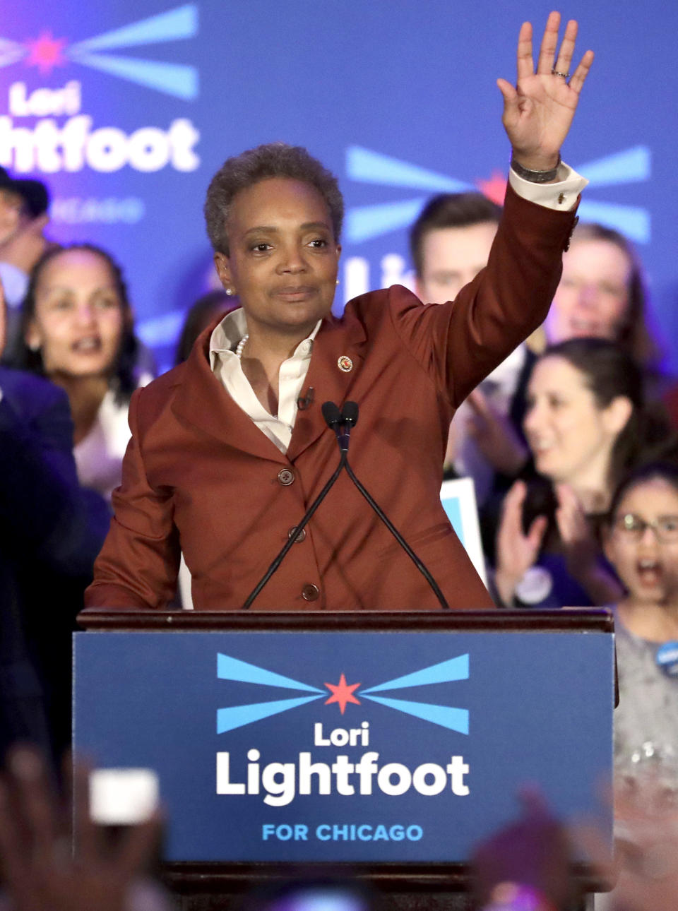 FILE - In this April 2, 2019, Lori Lightfoot waves to supporters as she speaks at her election night party in Chicago. Lightfoot is coming into the Chicago mayor’s office pledging to overhaul the city’s police force. She isn’t the first incoming mayor to make such a promise, but she may be the one with the best chance of actually getting it done. (AP Photo/Nam Y. Huh,File)