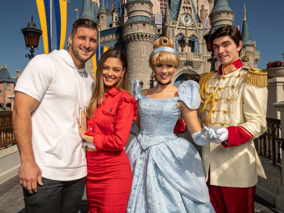 Tim Tebow and fiancée Demi-Leigh Nel-Peters at Disney World.