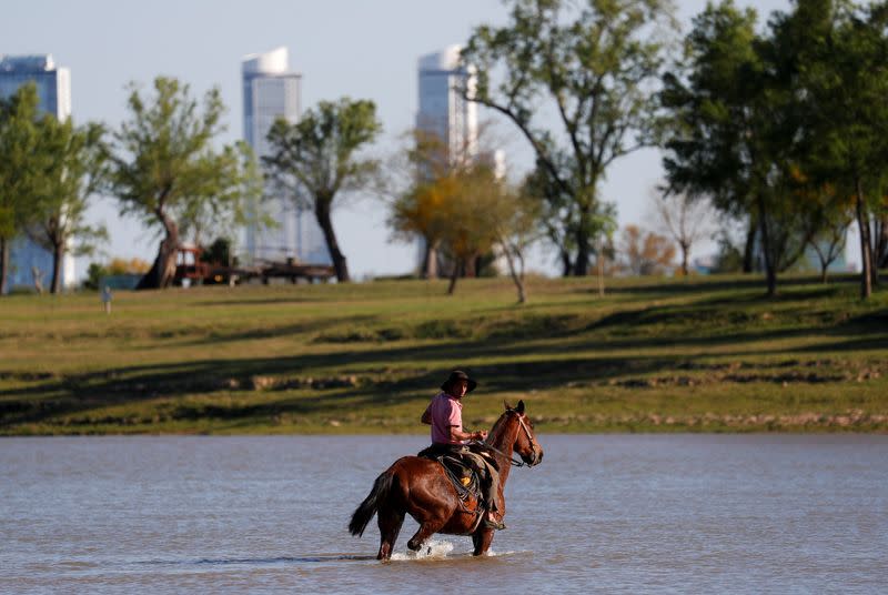 Rains hitting their lowest level in decades sap the water source for the mighty Parana River