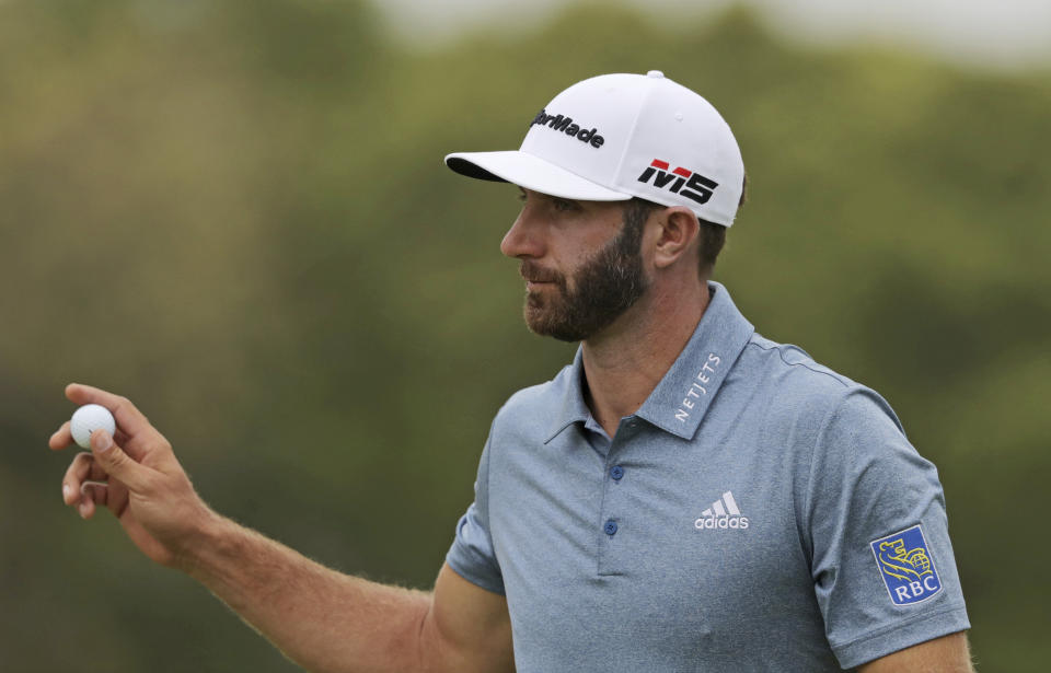 Dustin Johnson reacts after sinking a putt for birdie on the ninth hole during the final round of the PGA Championship golf tournament, Sunday, May 19, 2019, at Bethpage Black in Farmingdale, N.Y. (AP Photo/Charles Krupa)