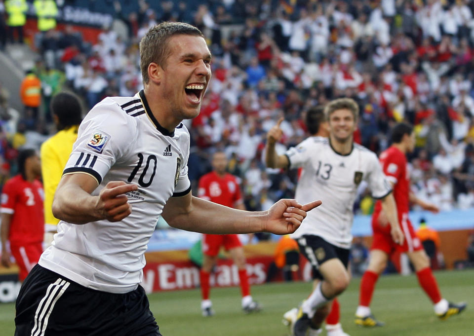 FILE - In this June 27, 2010 file photo Germany's Lukas Podolski celebrates after scoring his side's second goal past England goalkeeper David James, left, during the World Cup round of 16 soccer match between Germany and England at Free State Stadium in Bloemfontein, South Africa. (AP Photo/Kirsty Wigglesworth, File)