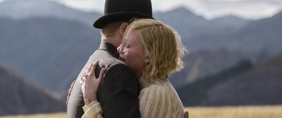 Kirsten Dunst, right, recalls crying on the set filming a "beautiful" scene with Jesse Plemons, her real-life partner and "The Power of the Dog" co-star.