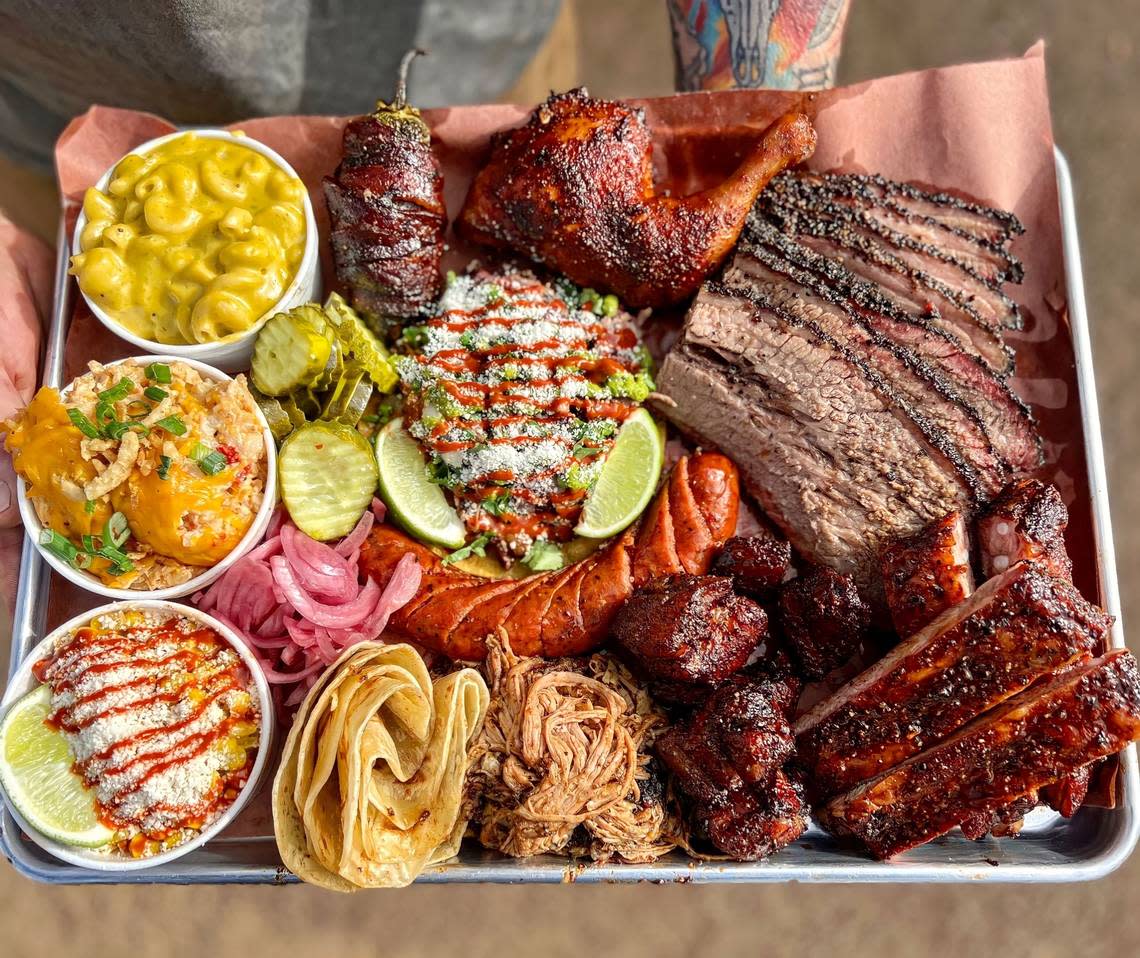 A Hurtado Barbecue combination plate with brisket, ribs, sausage and sides.