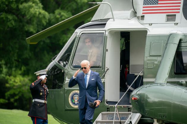 President Joe Biden salutes while disembarking Marine One on the South Lawn of the White House in Washington, D.C., on May 18, 2022. Biden traveled to Joint Base Andrews to receive a briefing on interagency efforts to prepare for and respond to hurricanes this season. (Photo: STEFANI REYNOLDS via Getty Images)