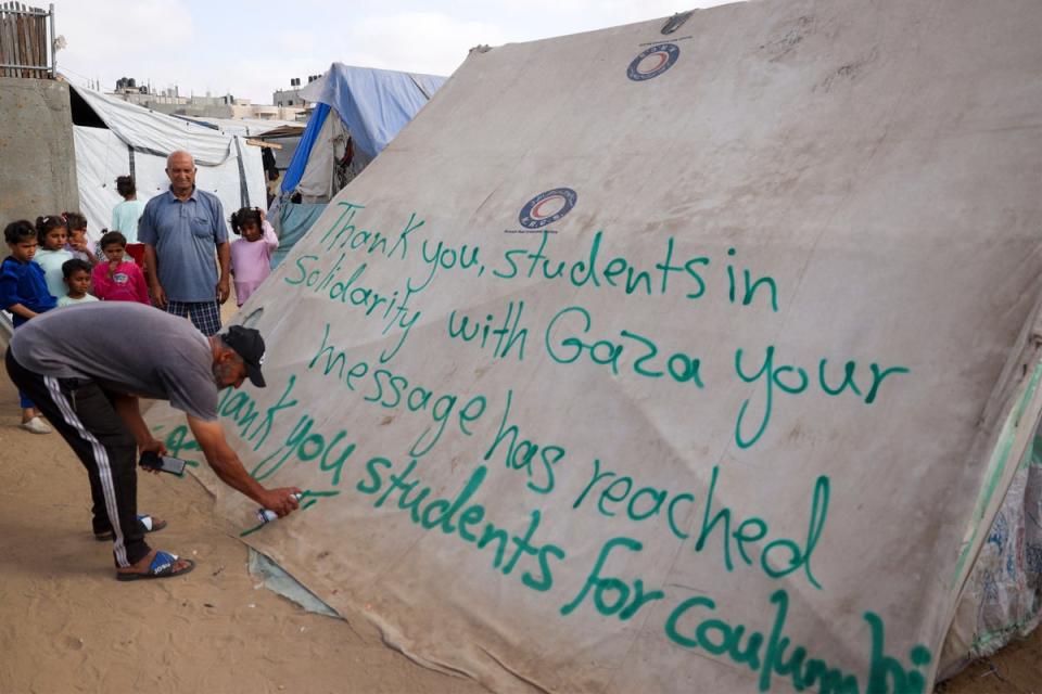 A sign in Gaza that reads, “Thank you, students in solidarity wtih Gaza your message has reached. Thank you students for Coulumbia” pictured on 28 April. More than 100 Gaza protesters were arrested at Columbia this week after they occupied a campus building (AFP via Getty Images)