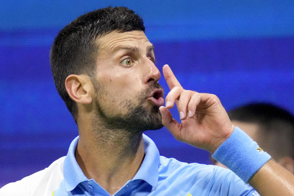 Novak Djokovic, of Serbia, motions during a match against Ben Shelton, of the United States, during the men's singles semifinals of the U.S. Open tennis championships, Friday, Sept. 8, 2023, in New York. (AP Photo/Charles Krupa)