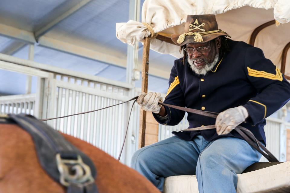 Paul Cook gets up on the wagon for Museum Day Saturday Sept. 1, 2018, at Fort Concho.