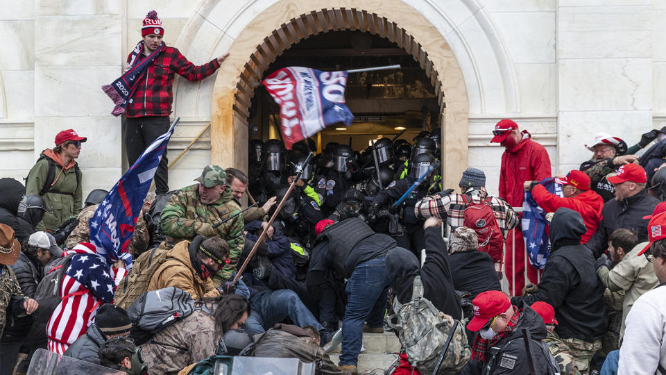 ioters clash with police outside the Capitol on Jan. 6, 2021.