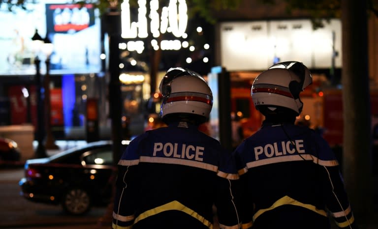 After killing a police officer and wounding two others just a few hundred metres from Paris's Arc de Triomphe, the gunman was shot dead in return fire while trying to flee on foot