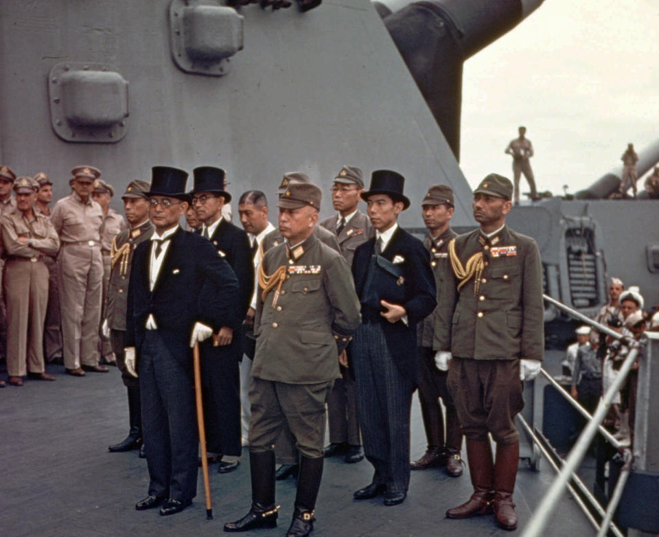 FILE - In this Sept. 2, 1945, file photo, Japanese surrender signatories arrive on board the USS Missouri in Tokyo Bay to participate in surrender ceremonies. Several dozen aging U.S. veterans, including some who were in Tokyo Bay that day, will gather on the battleship in Pearl Harbor in September to mark the 75th anniversary of Japan's surrender. (AP Photo, File)