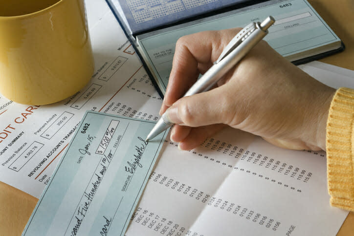 SmartAsset: What is a returned check fee?