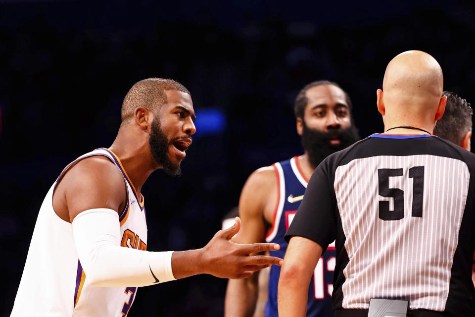 Phoenix Suns guard Chris Paul (3) argues with the referee during the first half of an NBA basketball game against the Brooklyn Nets, Saturday, Nov. 27, 2021, in New York. (AP Photo/Jessie Alcheh)