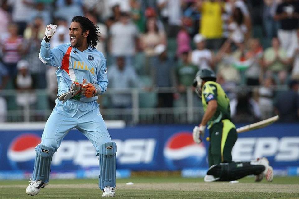 - SEPTEMBER 24: MS Dhoni of India celebrates his team's victory with Misbah-ul-Haq of Pakistan looking on during the Twenty20 Championship Final match between Pakistan and India at The Wanderers Stadium on September 24, 2007 in Johannesburg, South Africa