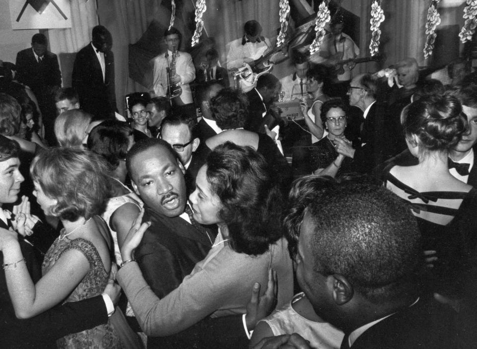 In this Dec. 13, 1964, file photo, Dr. Martin Luther King, Jr., and his wife Coretta Scott King, dance at the Malmen Hotel in Stockholm, Sweden where he was a guest of honor on the one year anniversary festivals for the Republic of Kenya. Three days earlier, Dr. King received the Nobel Peace Prize. (