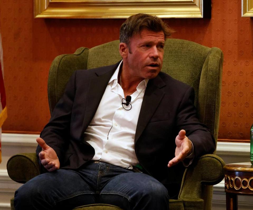 Taylor Sheridan speaks with John Goff during the Goodfellows charity luncheon at the Fort Worth Club in Fort Worth, Texas, Wednesday, Dec. 06, 2023. Special guest speaker was Tyler Sheridan creator of the hit TV series Yellowstone. (Special to the Star-Telegram Bob Booth)