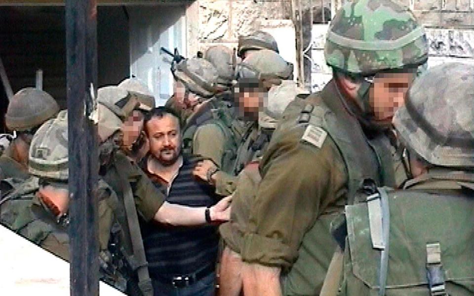 Marwan Barghouti's arrest in Ramallah in 2002 - Credit: AP Photo/HO/Israel Defense Forces
