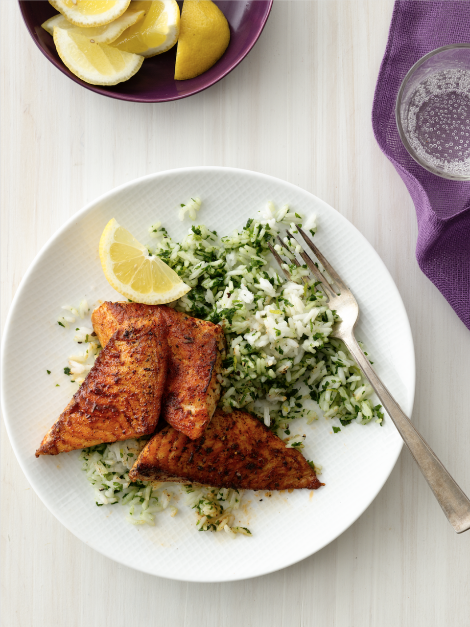 <p>Cajun spices like paprika, garlic powder and cayenne bring the Big Easy's bold flavors to this tilapia dish.</p><p>Get the <strong><a href="https://www.goodhousekeeping.com/food-recipes/a14343/blackened-fish-green-rice-recipe-wdy1012/" rel="nofollow noopener" target="_blank" data-ylk="slk:Blackened Fish with Green Rice recipe;elm:context_link;itc:0;sec:content-canvas" class="link ">Blackened Fish with Green Rice recipe</a>. </strong> </p>