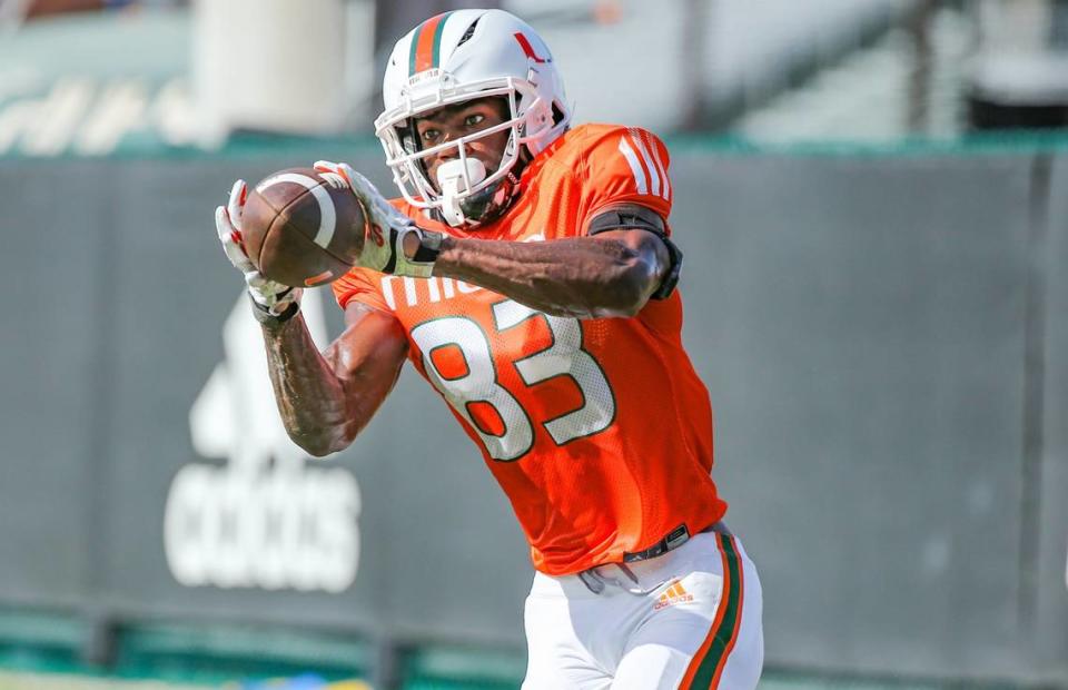 Miami Hurricanes wide receiver Michael Redding III (83) catches a pass during practice drills at Greentree Practice Field at the University of Miami in Coral Gables on Thursday, August 11, 2022.