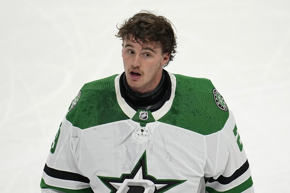 Dallas Stars goaltender Jake Oettinger (29) reacts toward the team bench during an ice-cleaning break in the third period of an NHL hockey game against the Minnesota Wild, Thursday, Dec. 29, 2022, in St. Paul, Minn. (AP Photo/Abbie Parr)