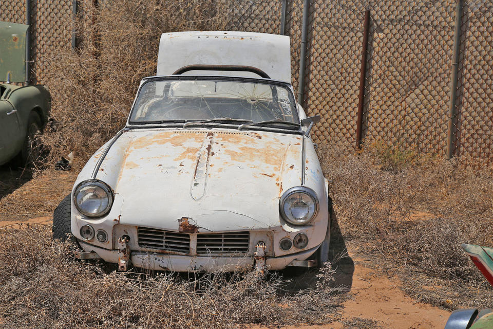 <p>Although the Triumph Spitfire (1962-1980) played second fiddle to the MG MGB in terms of production volumes, it was still a strong seller, with a total of <strong>314,000 </strong>being built. The car survived for five generations, and this 1965 parts car is a MkII. Manufactured between 1965 and 1967, just <strong>37,409</strong> of them were sold.</p><p>Thanks to its 67bhp engine, which took the car to 60mph in about 15sec, performance did not match its sporty appearance. This car is also at <strong>Desert Valley Auto Parts.</strong></p>