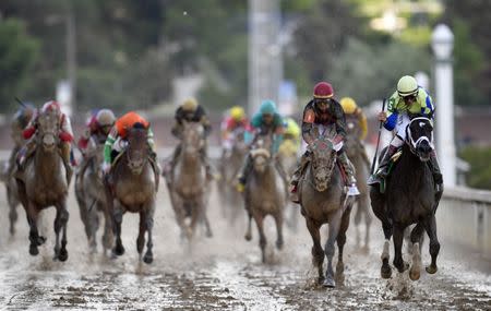 May 6, 2017; Louisville , KY, USA; John Velazquez aboard Always Dreaming (5) leads the field and wins the 2017 Kentucky Derby at Churchill Downs. Mandatory Credit: Jamie Rhodes-USA TODAY Sports