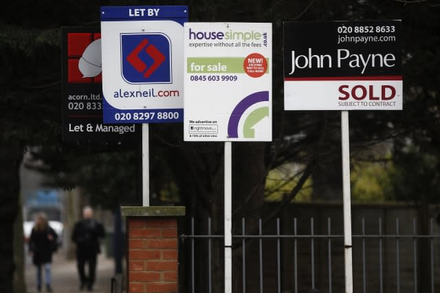 Estate Agents For Sale Signs And Residential Properties As U.K. House-Price Growth Slows