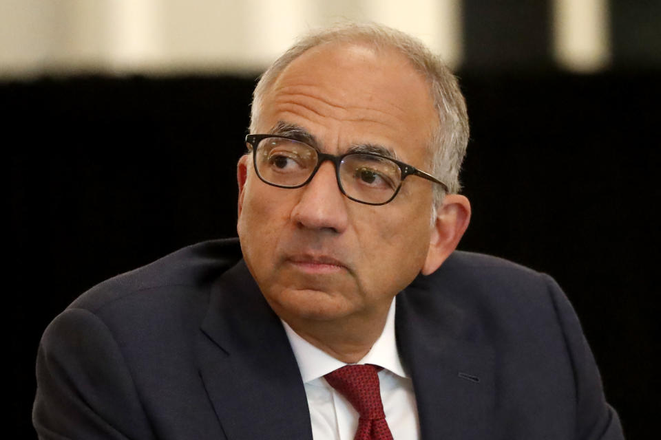 U.S. Soccer President Carlos Cordeiro presides over a meeting of the U.S. Soccer Board of Directors Friday, Dec. 6, 2019, in Chicago. (AP Photo/Charles Rex Arbogast)