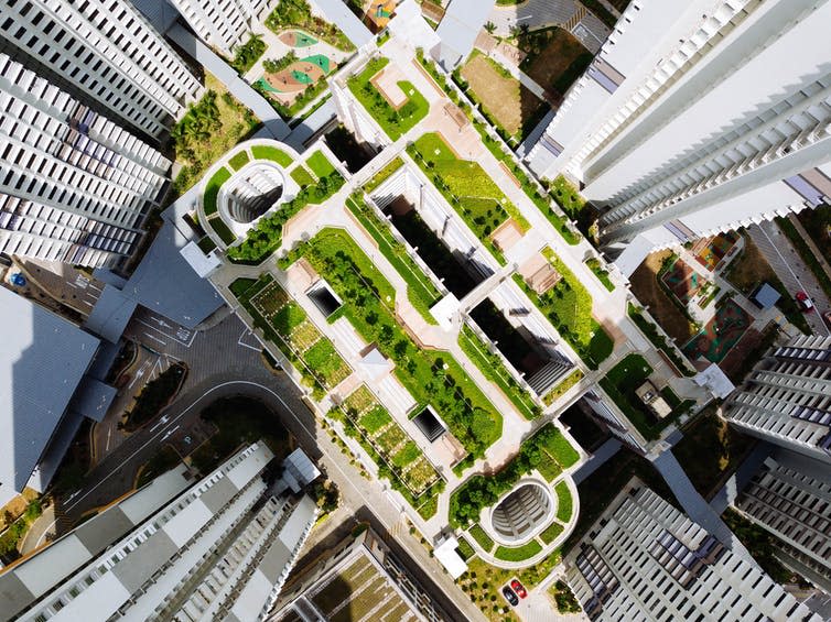 Green spaces in between high-rise buildings, seen from above