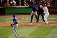 ST LOUIS, MO - OCTOBER 19: Albert Pujols #5 of the St. Louis Cardinals is intentionally walked by C.J. Wilson #36 of the Texas Rangers in the bottom of the fifth inning during Game One of the MLB World Series at Busch Stadium on October 19, 2011 in St Louis, Missouri. (Photo by Jamie Squire/Getty Images)