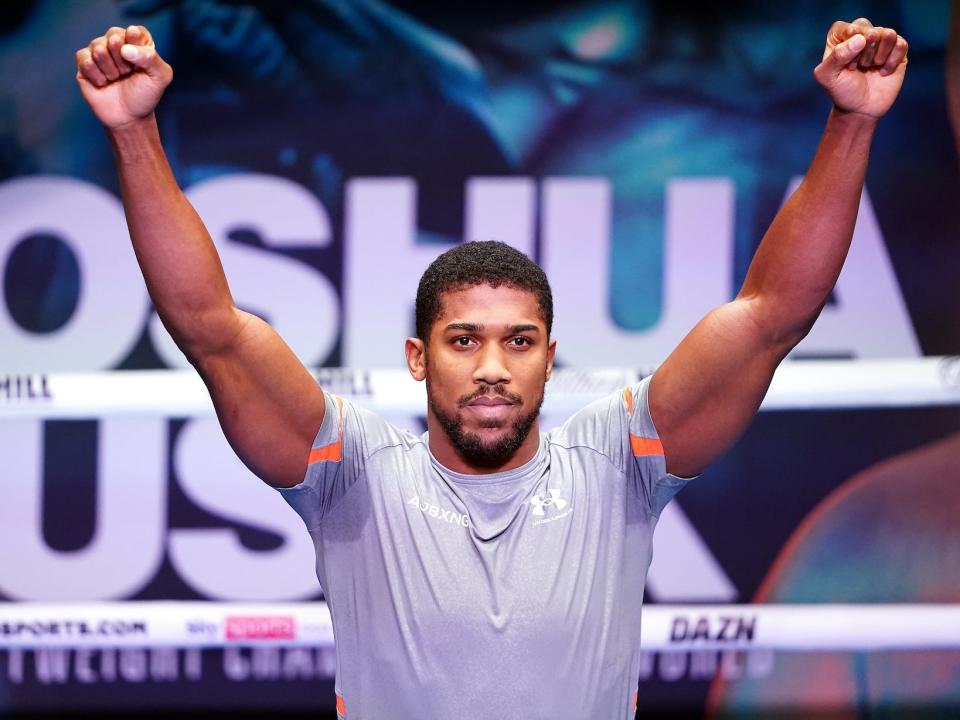 Anthony Joshua gestures at a boxing event September 21.
