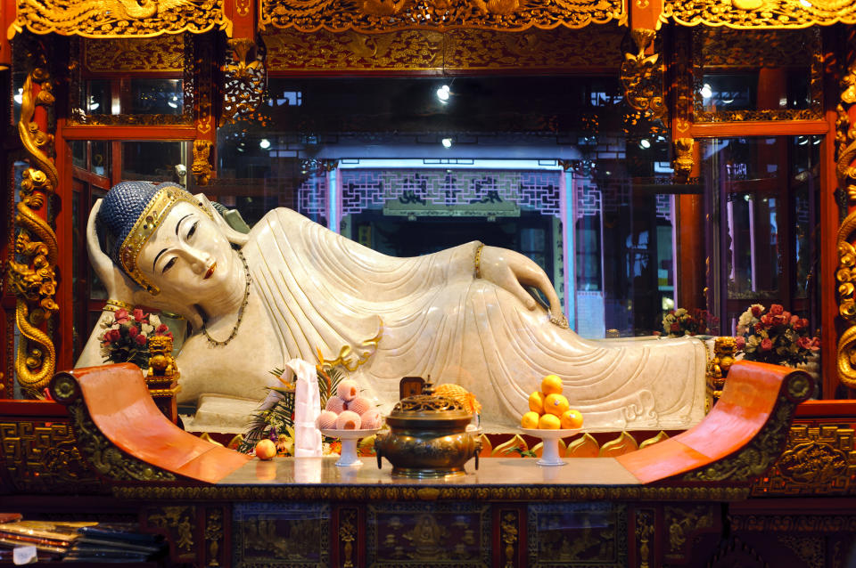 The reclining Buddha statue in Shanghai's Jade Buddha Temple is a 96-centimetre-long Buddha carved in white jade. (Photo: Gettyimages)
