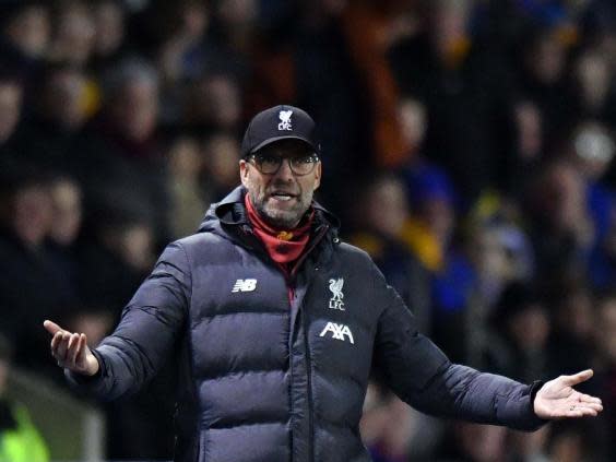 Klopp will not be at Anfield (AFP via Getty)