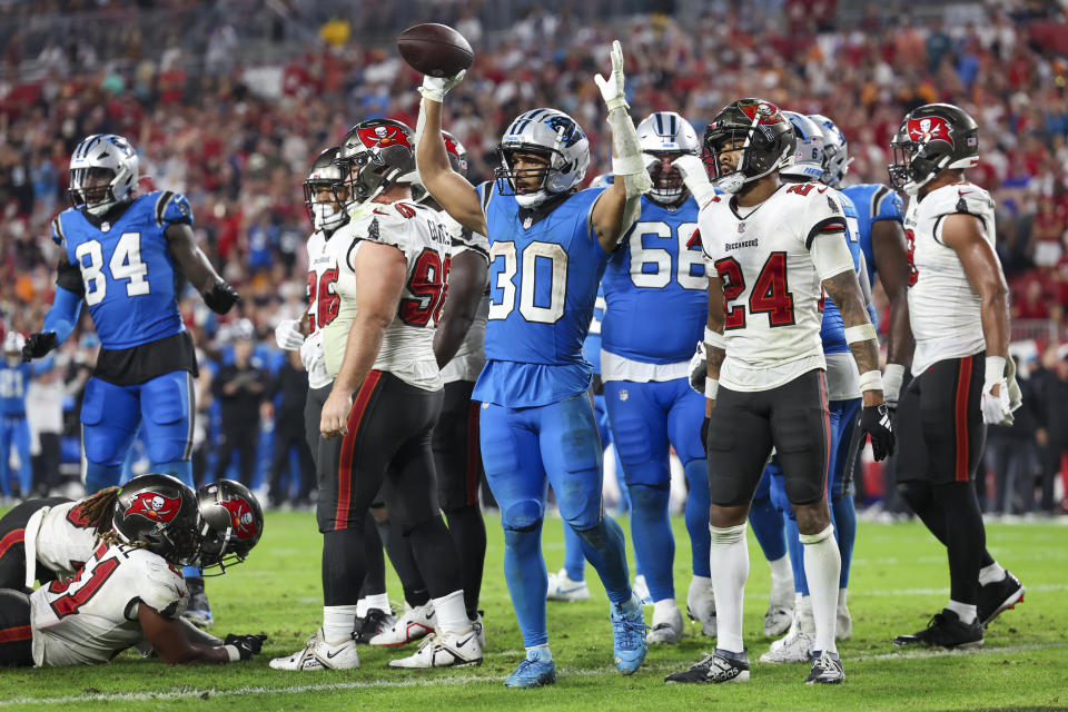 Carolina Panthers running back Chuba Hubbard celebrates after scoring against the Tampa Bay Buccaneers during the second half of an NFL football game Sunday, Dec. 3, 2023, in Tampa, Fla. (AP Photo/Mark LoMoglio)